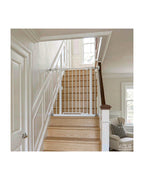 Born Light 43 inch baby safety gate mounted at the top of a staircase, white finish, 29.7-41 inch adjustable width